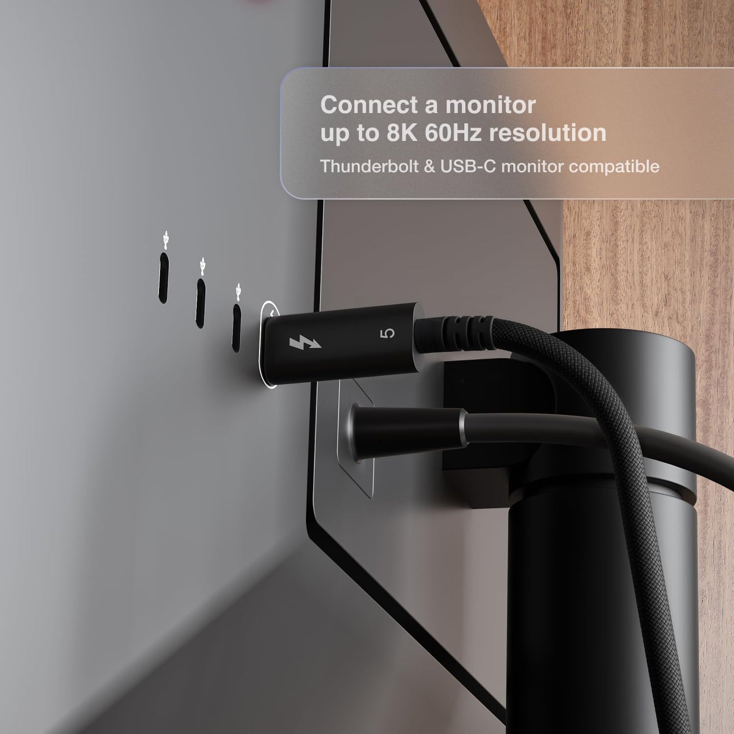 A 2m CalDigit Thunderbolt 5 Pro Cable connected to a monitor's Thunderbolt port.