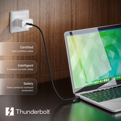 An image of a laptop on a desk with the Thunderbolt 5 Pro Cable connected to it and the other end of the cable is going into a SUB-C charger connected to a wall outlet. There is text on the image indicating features of the cable and a Thunderbolt logo.