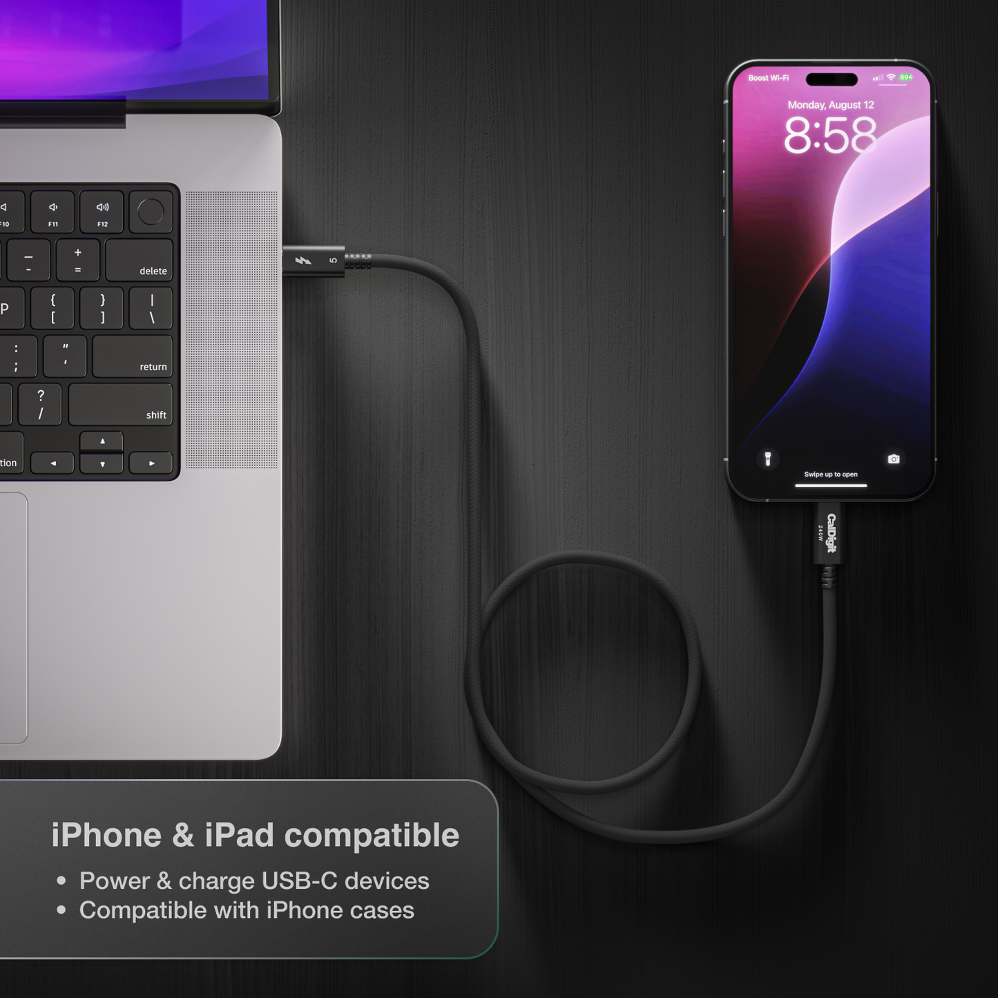 An overhead image looking down on a desk with a Thunderbolt 5 Pro Cable connected to both an iPhone and laptop. There is text on the image indicating the cable is iPhone and iPad compatible.