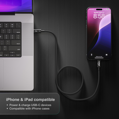 An overhead image looking down on a desk with a Thunderbolt 5 Pro Cable connected to both an iPhone and laptop. There is text on the image indicating the cable is iPhone and iPad compatible.
